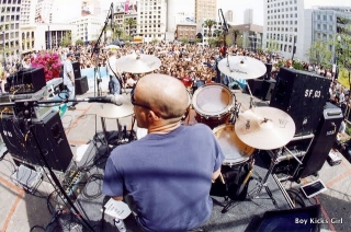 Boy Kicks Girl playing in Union Square with Blink 182